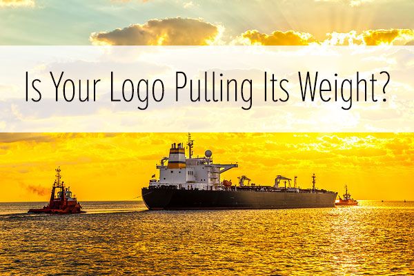 Tugboat pulling a freighter